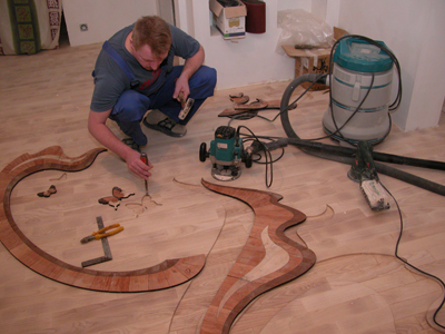 Pose de sols d'art Pose de parquet