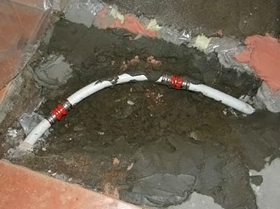 Réparation d'un plancher d'eau chaude Réparation d'un plancher d'eau chaude