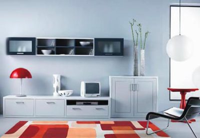 La géométrie des rectangles dans cette pièce peut être tracée à la fois dans le motif de tapis, sous la forme de meubles et dans les lignes d'étagères murales La géométrie des rectangles dans cette pièce peut être tracée à la fois dans le motif de tapis, sous la forme de meubles et dans les lignes d'étagères murales