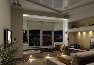 Le soir, l'éclairage au sol du podium crée une mystérieuse atmosphère romantique dans la pièce. Le soir, l'éclairage au sol du podium crée une mystérieuse atmosphère romantique dans la pièce.