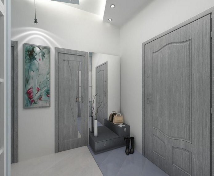 La combinaison de carreaux et de stratifié blanc dans le couloir