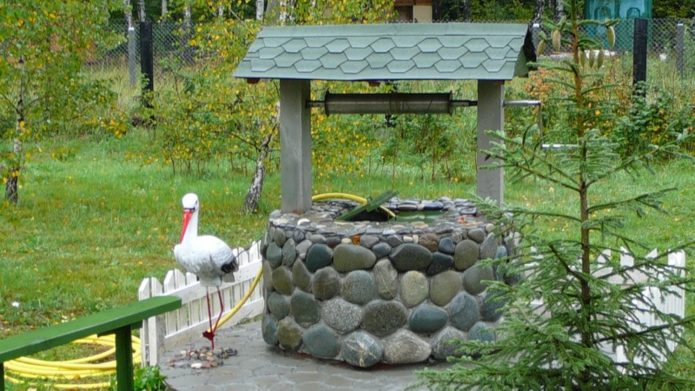 Maison de puits en pierre