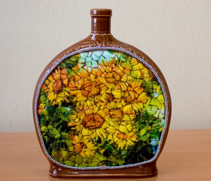 Bouteille décorée de coquille